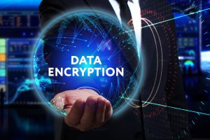Business, Technology, Internet and network concept. Young businessman working in the field of the future, he sees the inscription: data encryption