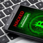 bitcoin wallet hacked message on smart phone screen. cryptocurrency theft concept