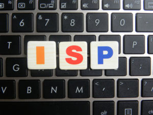 Word ISP (Internet Service Provider) on keyboard background