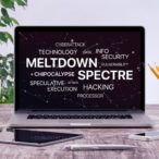 Meltdown and spectre threat concept. Chipocalypse meltdown and spectre threat on laptop screen in office workplace.